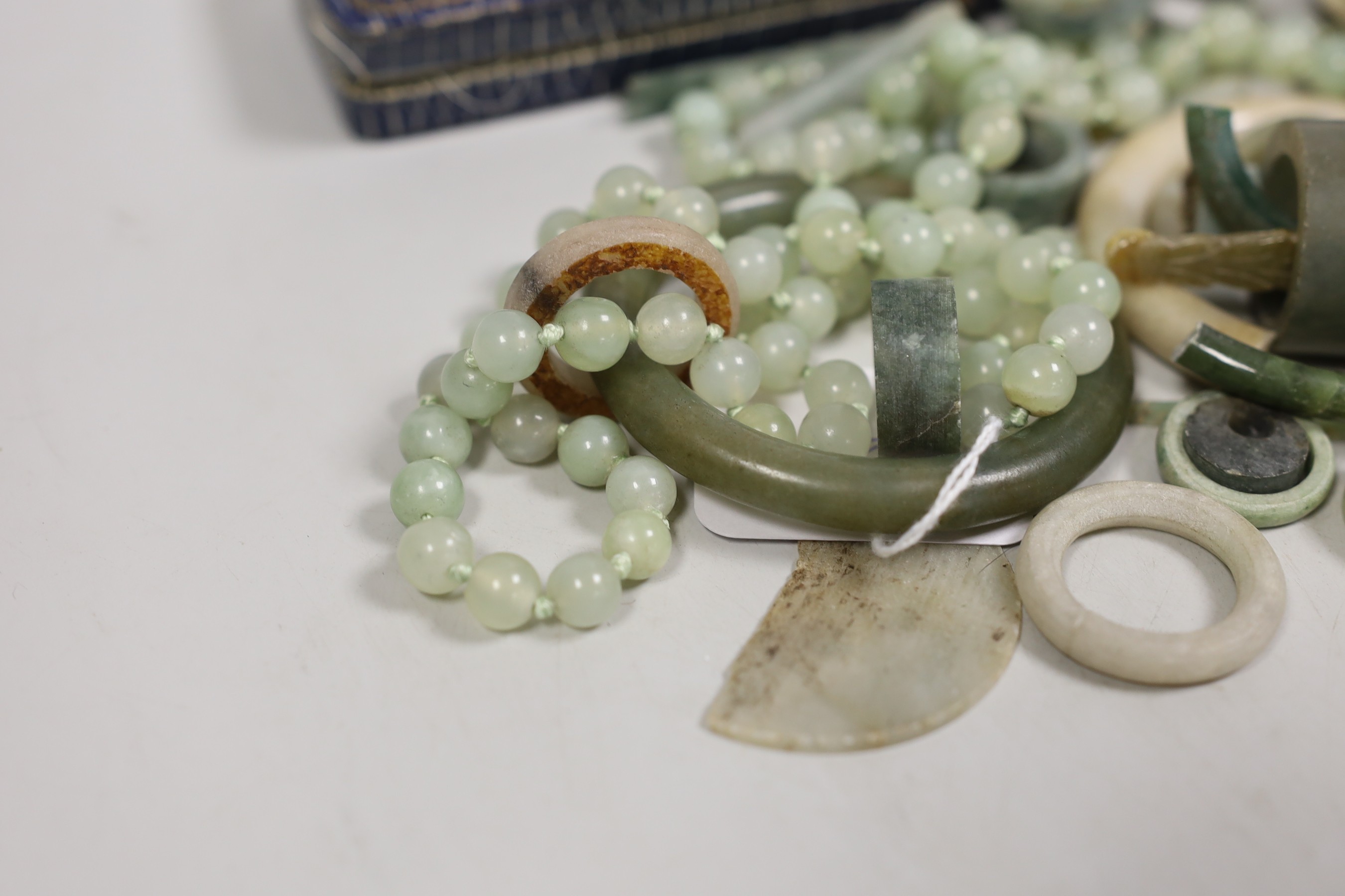 A Chinese hardstone bead necklace and related jade, jadeite etc. jewellery parts